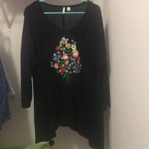 Black top with colorful details